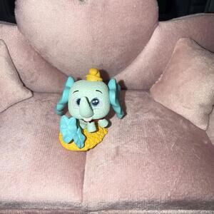 Cute Small Elephant Figurine with Blue Ears and Yellow Hat